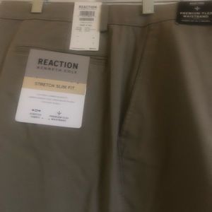 Reaction khaki dress pants never worn. Size 33x 30L. Originally $85